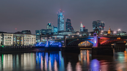 Fototapeta na wymiar London cityscape reflection at night