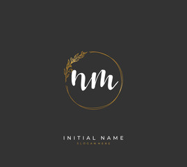 Handwritten letter N M NM for identity and logo. Vector logo template with handwriting and signature style.