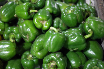 Fototapeta na wymiar Green bell peppers in the market