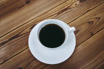 白いカップに入ったコーヒー