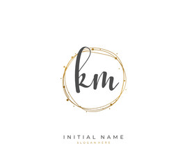Handwritten letter K M KM for identity and logo. Vector logo template with handwriting and signature style.