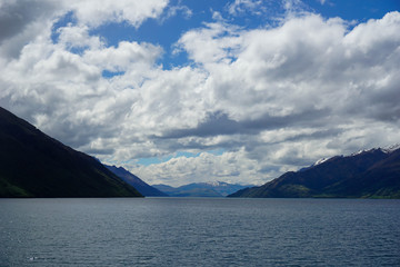 Lake, mountains, trees, sky, clouds in New Zealand