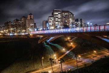 lima night city with lights ,street and bridge