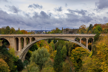 Aerial view of the Adolphe or New Bridge in the UNESCO World Heritage Site old town of the city of Luxembourg, in fall