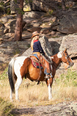 Cowgirl on Paint Horse