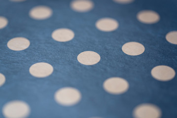 Gold dots on a black background