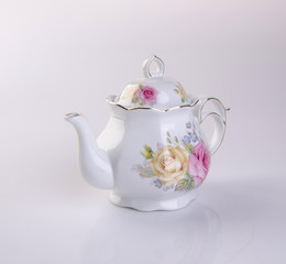 tea pot or ceramic teapot on a background new.