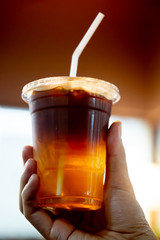 Glass of espresso shot mixed with soda or sparkling water
