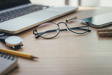 Fototapeta premium mockup image.office equipment on desk table wooden.blank background empty copy space for text design studio creativity ideas for study,education,business modern accessories at workplace.blogging,blog 