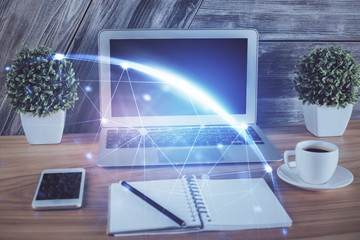 Computer on desktop with social network theme icon. Multi exposure. Concept of international...