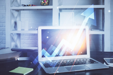 Computer on desktop with point up arrows hologram. Double exposure. Concept of success.