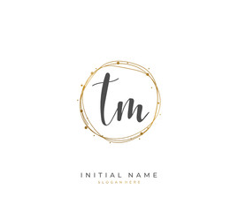Fototapeta premium Handwritten letter T M TM for identity and logo. Vector logo template with handwriting and signature style.