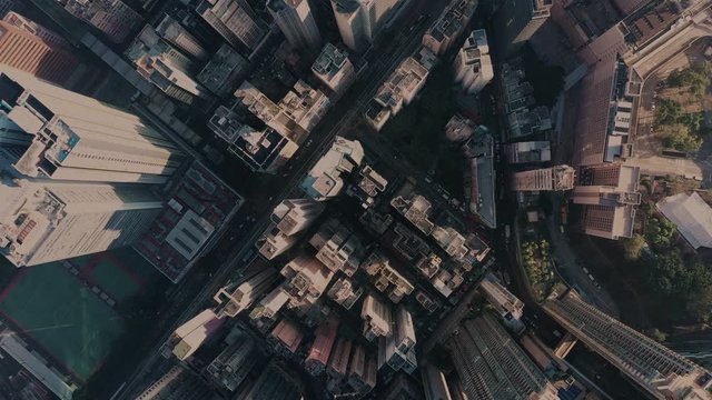 Aerial view city central park, trains, buildings and skyscrapers in New York during the day under blue skies. Best New York aerial shot. Wide shot on 4K RED camera.