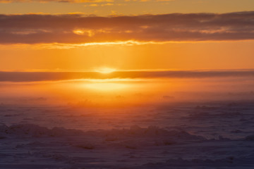 Naklejka na ściany i meble Sun Rise over the Bering Sea