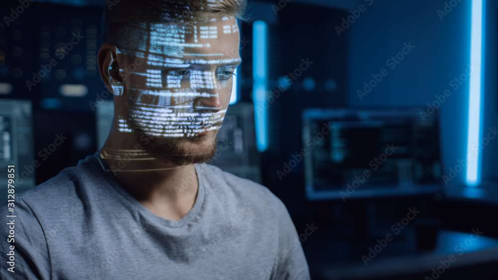Aufkleber Handsome Young Software Developer Working on Personal Computer in Digital Identity Cyber Security Data Center, Program Coding Language Reflects on His Face. Futuristic Hacking and Programming Concept