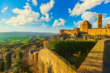 Tuscany, Volterra town skyline, church and panorama view on sunset. Italy - obrazy, fototapety, plakaty