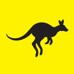 Silhouette of a kangaroo animal on a yellow isolated background. Vector image