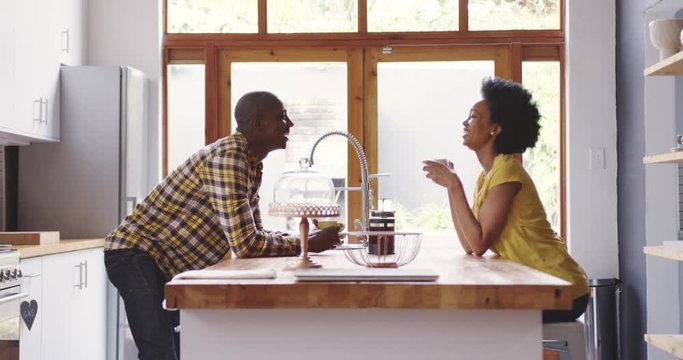 African American woman and man family spending time at home together