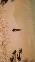 Beautiful girl enjoying a sunny day at the beach