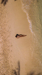 Beautiful girl enjoying a sunny day at the beach
