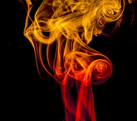 Colored smoke on black background