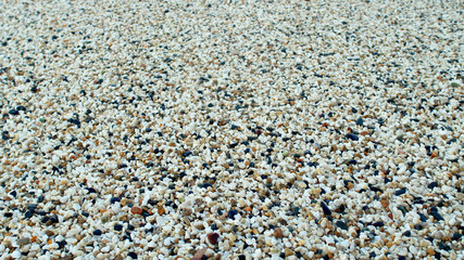 abstract background of fine sea gravel, close-up
