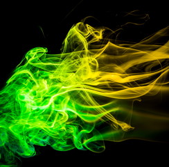 Colored smoke on black background