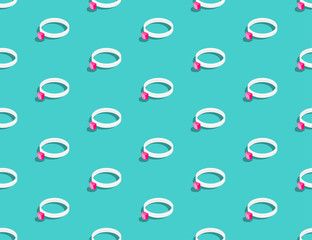 Wedding ring with pink diamond 3D isometric seamless pattern, Marriage concept poster and social banner post design illustration isolated on green background with copy space, vector eps 10