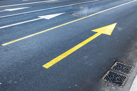 Arrows Road Marking On Empty Asphalt Urban Road