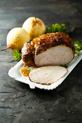 Homemade glazed ham with pear sauce