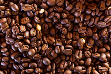 Close-up of brown coffee. coffee bean background. space fill with coffee bean.