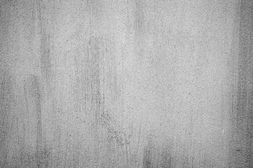 Texture of a concrete wall with cracks and scratches which can be used as a background