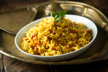 Homemade vegetarian rice pilau with fresh parsley