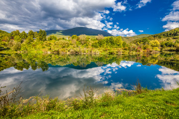 Fototapeta na wymiar Reflection In Una River- Croatia And Bosnia Border