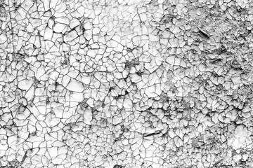 Texture of a concrete wall with cracks and scratches which can be used as a background