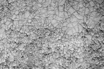 Texture of a concrete wall with cracks and scratches which can be used as a background