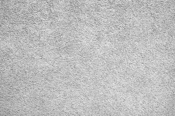 Texture of a concrete wall with cracks and scratches which can be used as a background