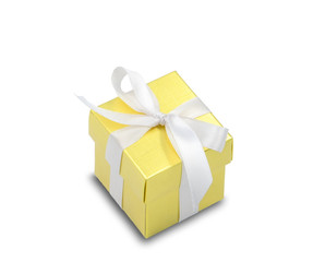 closed gift box gold color package object wrap with white satin bow ribbon isolated on white background