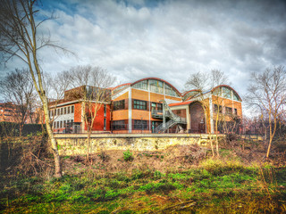 colorful abandoned factory warehouse building exterior