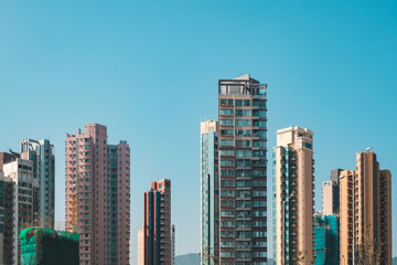 residential skyscraper buildings, skyline and blue sky in Hong Kong -