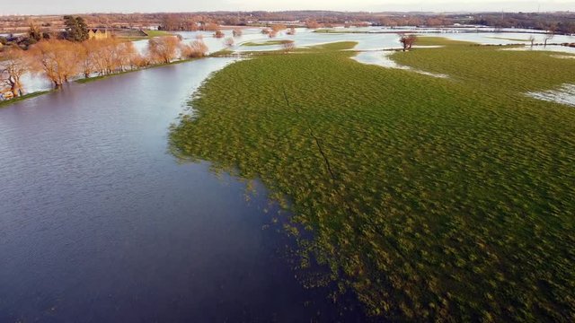 Fields flooded by burst River Trent in Derbyshire, UK