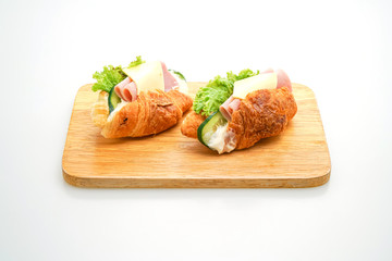 sandwich croissant ham cheese with .mayonnaise