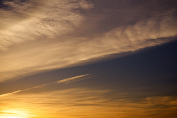 Beautiful fiery sunset sky as abstract background.
