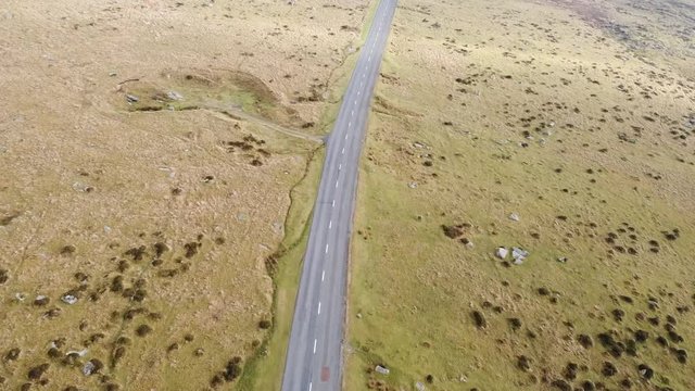 Aerial view of scenic road through Dartmoor National Park - UK