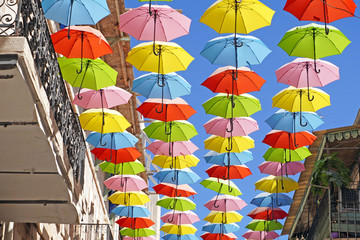 Fototapeta na wymiar Colored Umbrellas installation in Jerusalem Israel