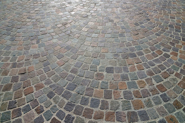 Old cobblestone pavement close-up.