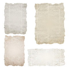 Set of torn newspaper pieces isolated on white background. Old grunge newspapers textured paper collection