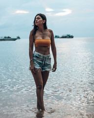 Beautiful girl enjoying a sunny day at the beach