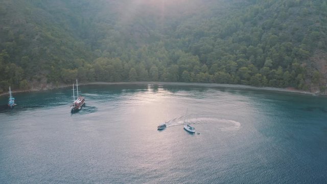 Aerial drone of cove near Kos, Greece near Turkey, luxury boats in blue water