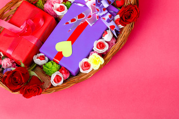 Fototapeta na wymiar Gift box,red rose flower in wooden basket. Valentine day concept 
